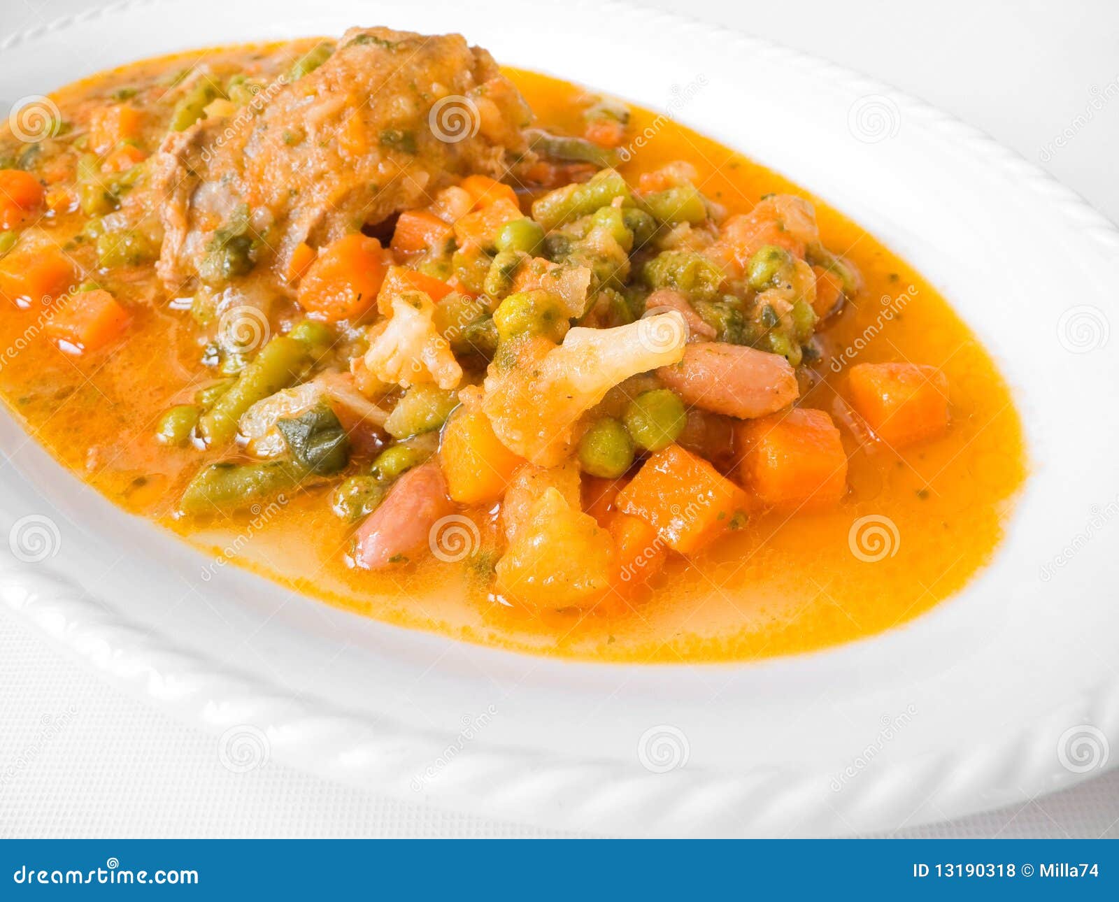 Meat Roulade with Vegetable Soup on White Dish. Stock Photo Image of