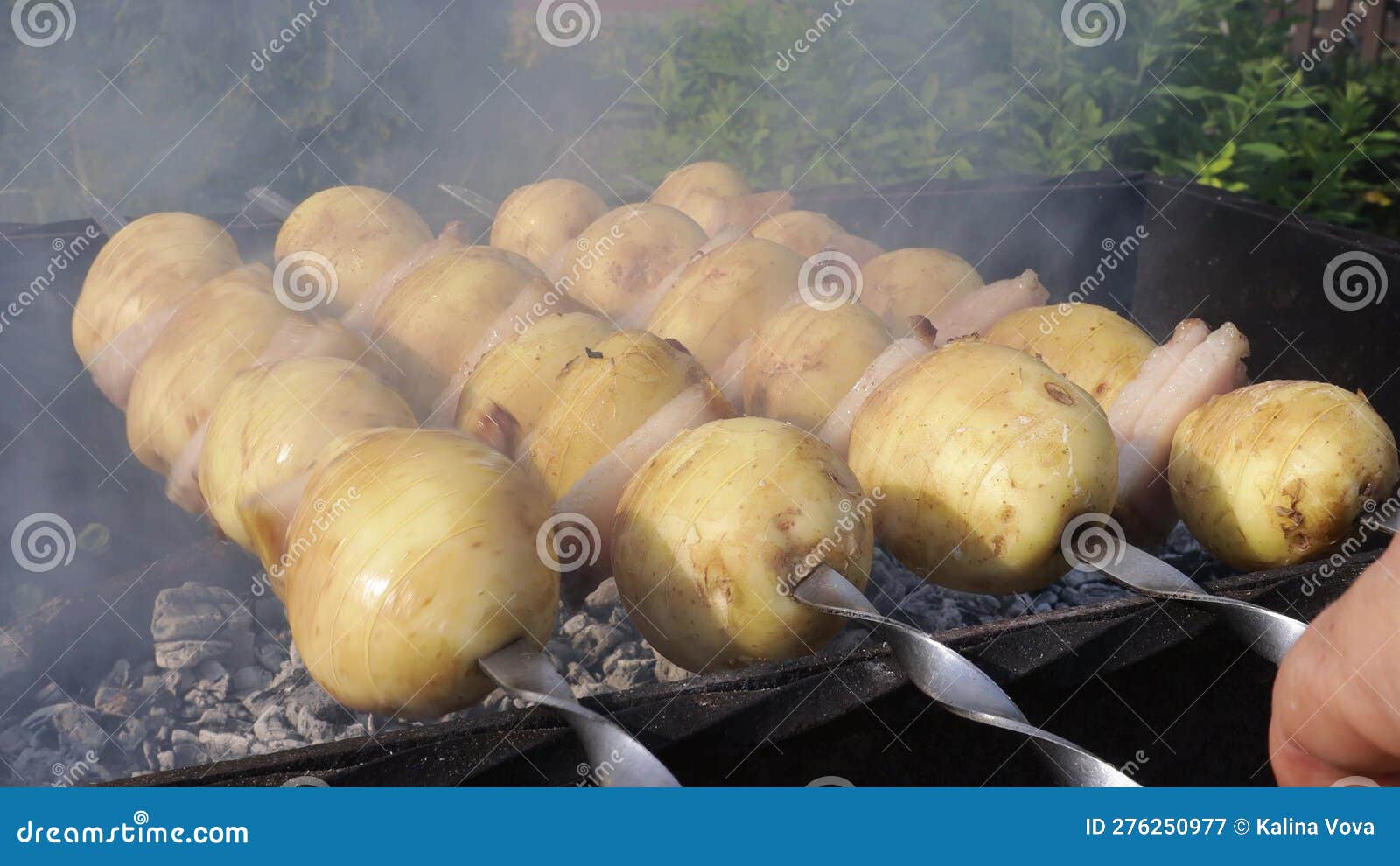 A Meat Steak Fried on a Wire Rack with Smoke and Fire Stock Image