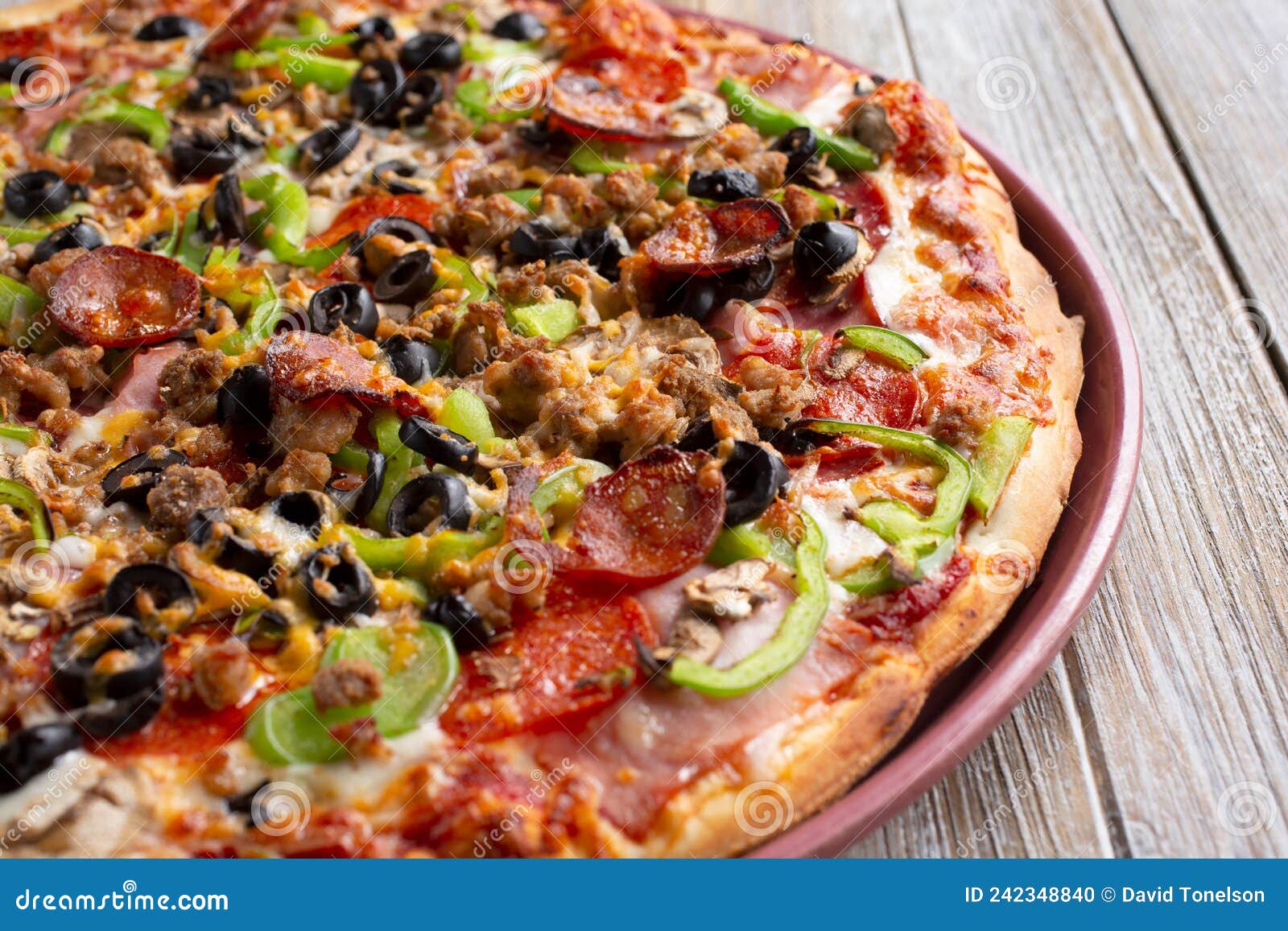 Meat and veggie pizza stock photo. Image of kitchen 242348840