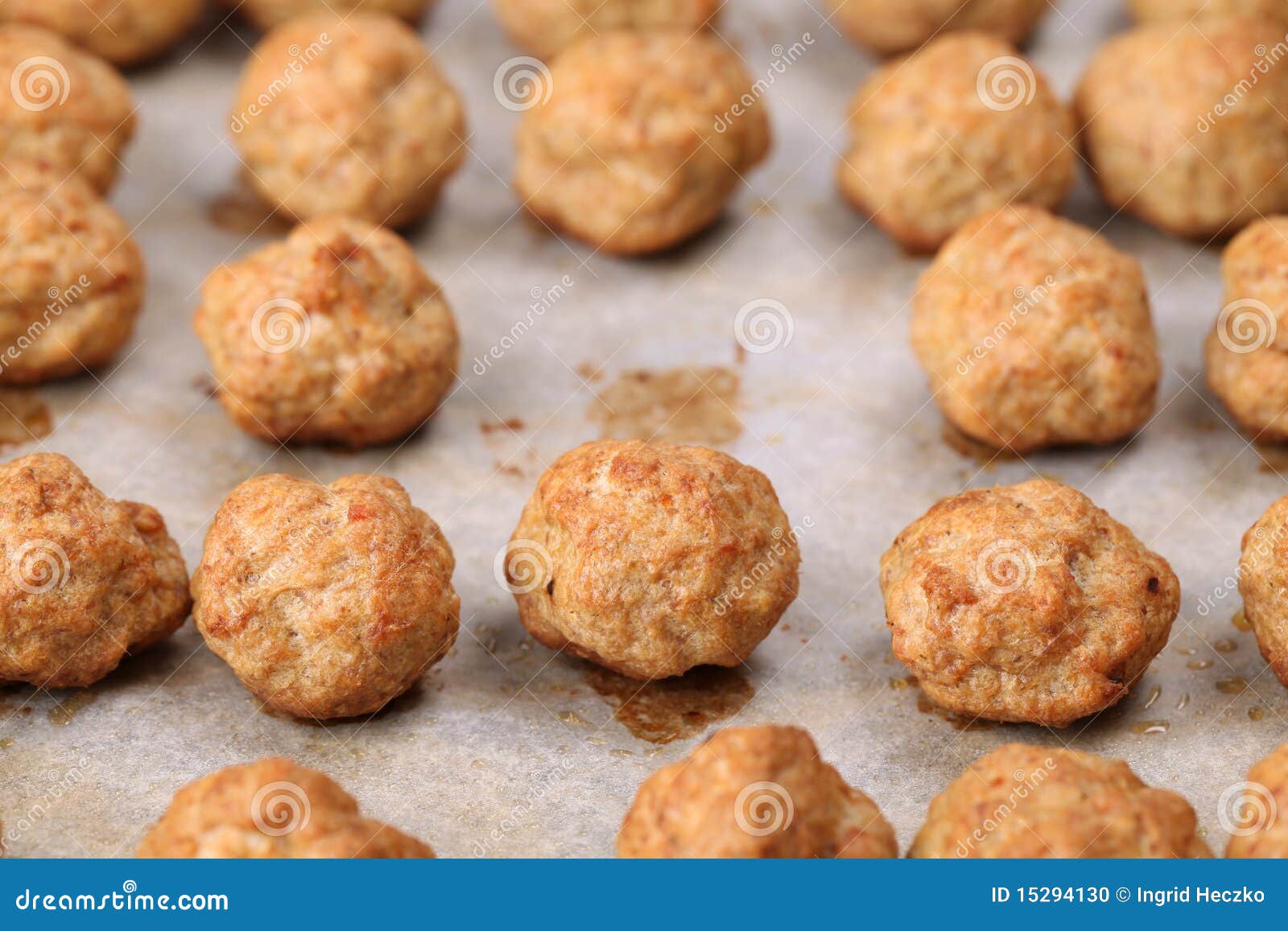 Meatballs on baking sheet stock photo. Image of minced 15294130
