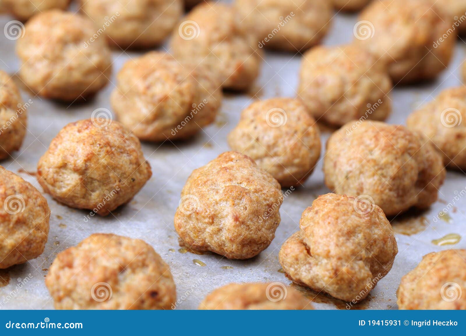 Meatballs on baking sheet stock image. Image of tray 19415931