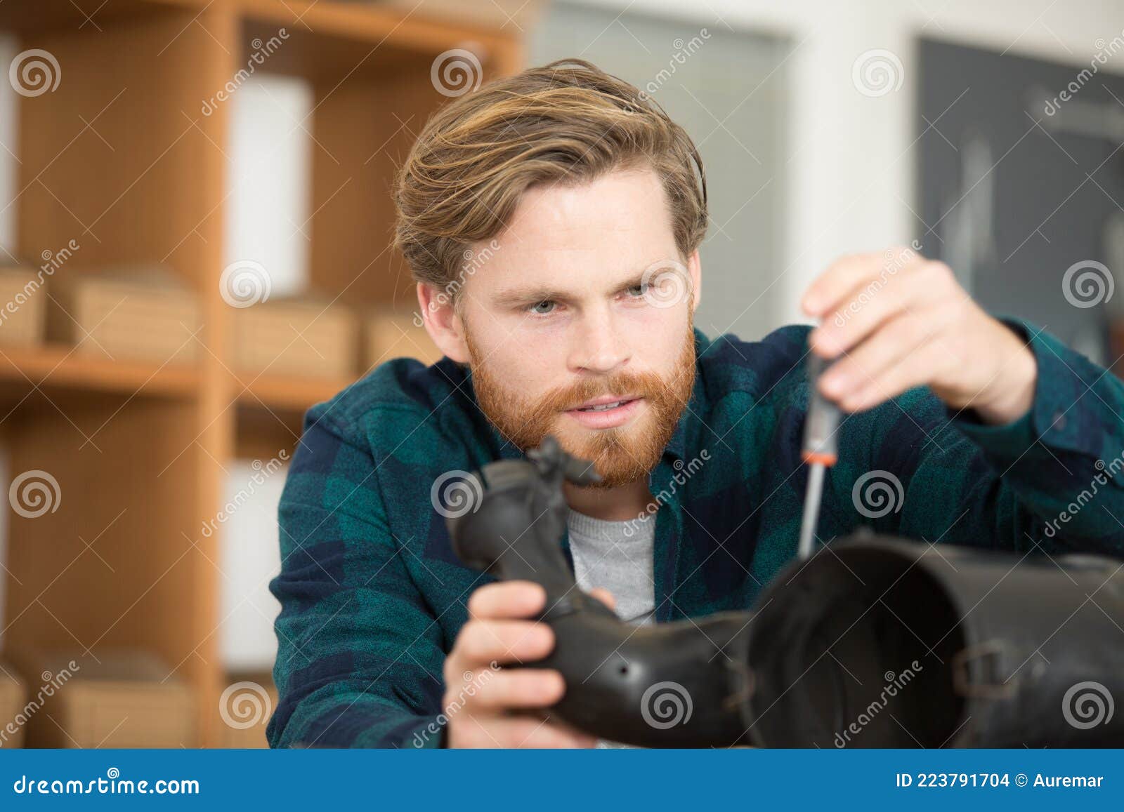 Mechanic Assembling Car Parts in Stock Photo Image of