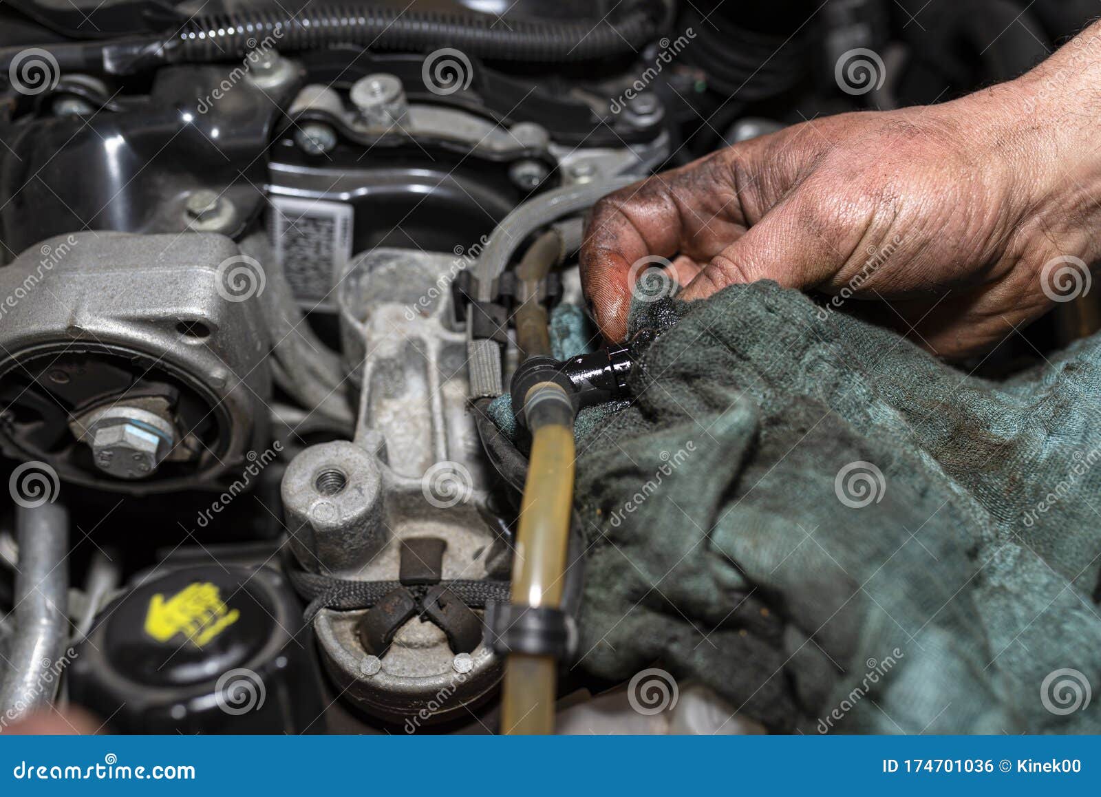 The Mechanic Bleeds the Fuel System with a Pump that is on the Fuel