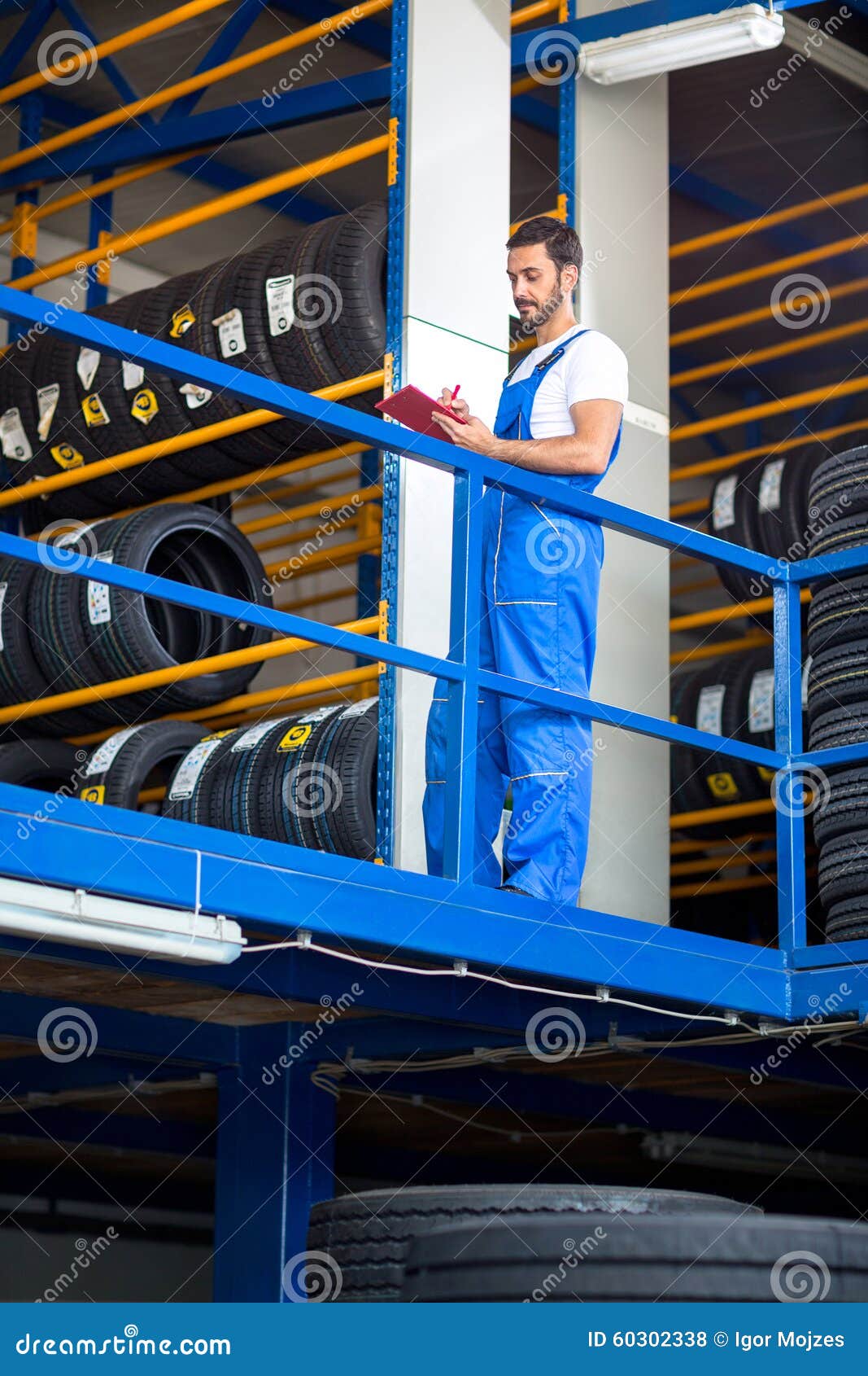 Mechanic Blue Uniform Checking Stack Tires Stock Photos Free
