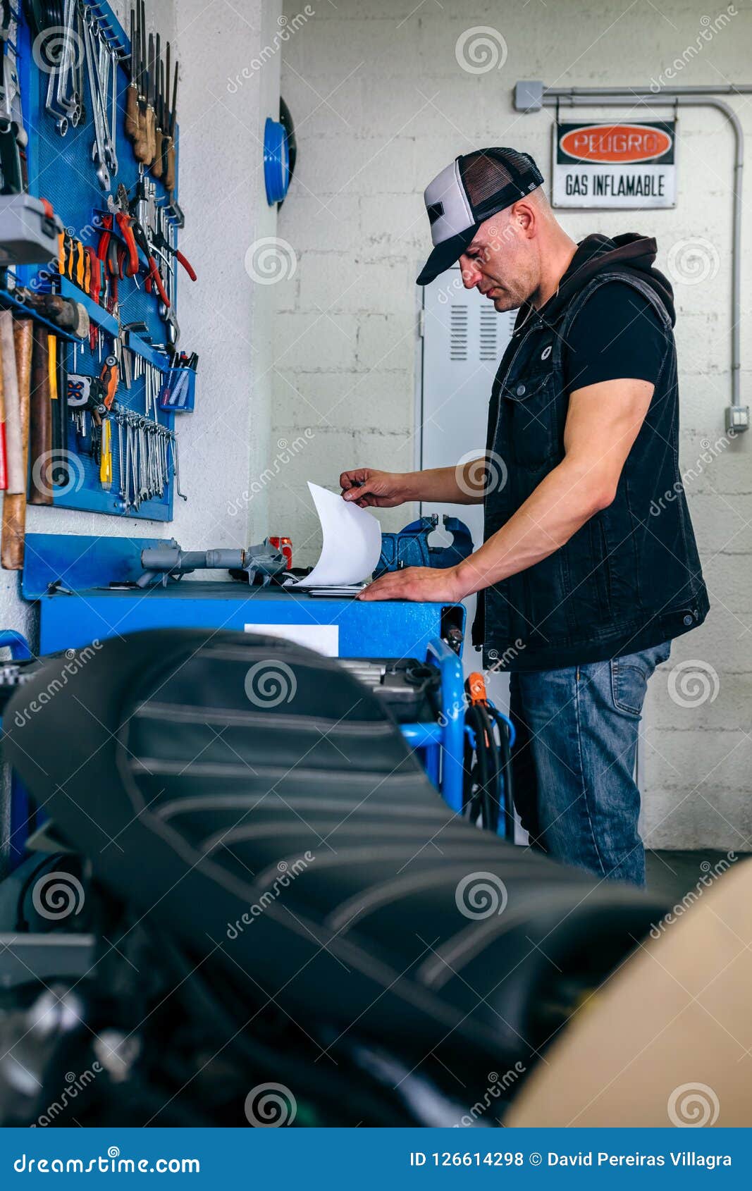Mechanic Checking Motorcycle Stock Photo Image of mechanic, bike