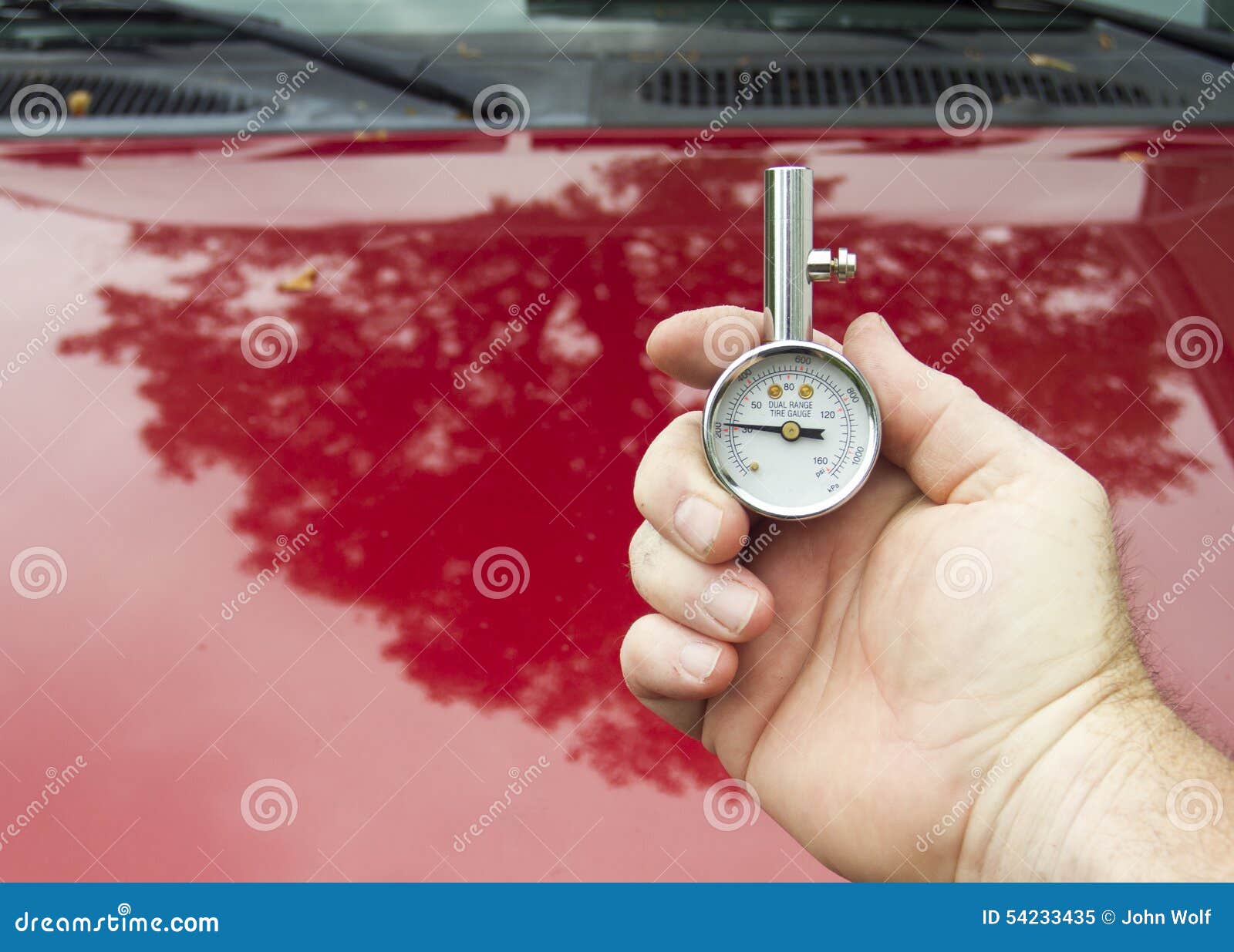 Checking The Tire Pressure With A Pressure Gauge Is Important For Safe