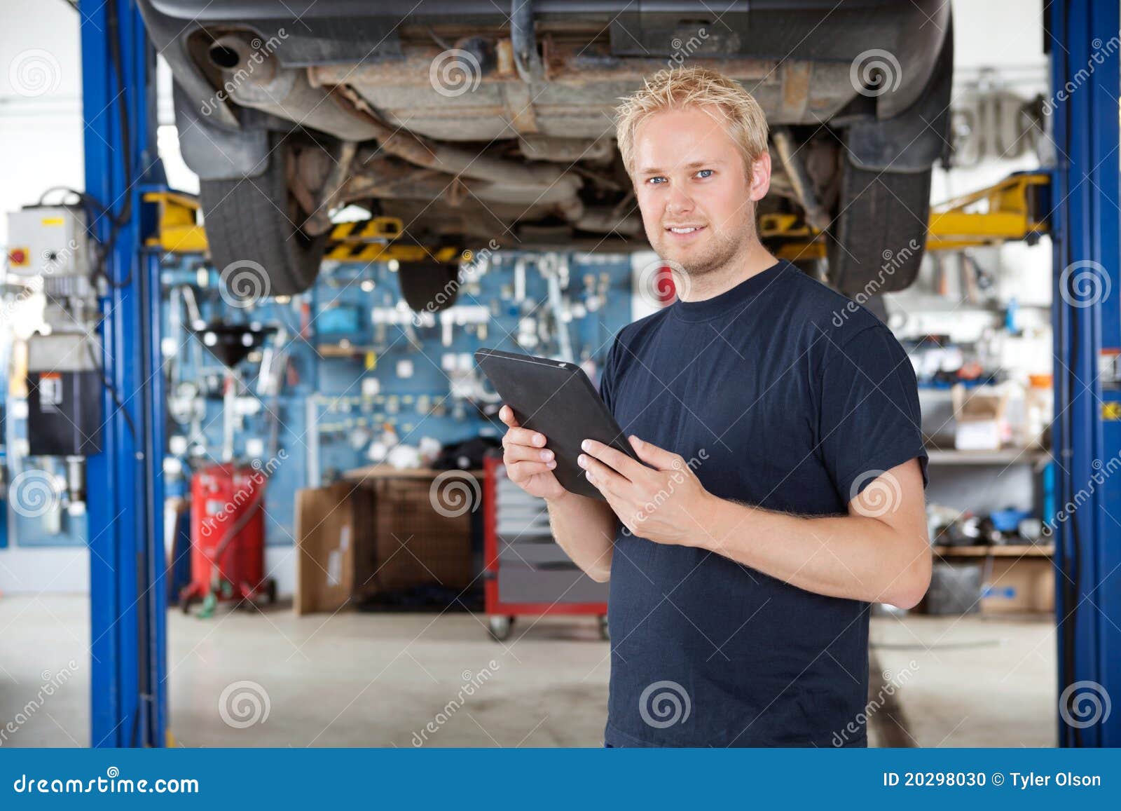 Mechanic with Digital Tablet Stock Photo Image of adult, inspection