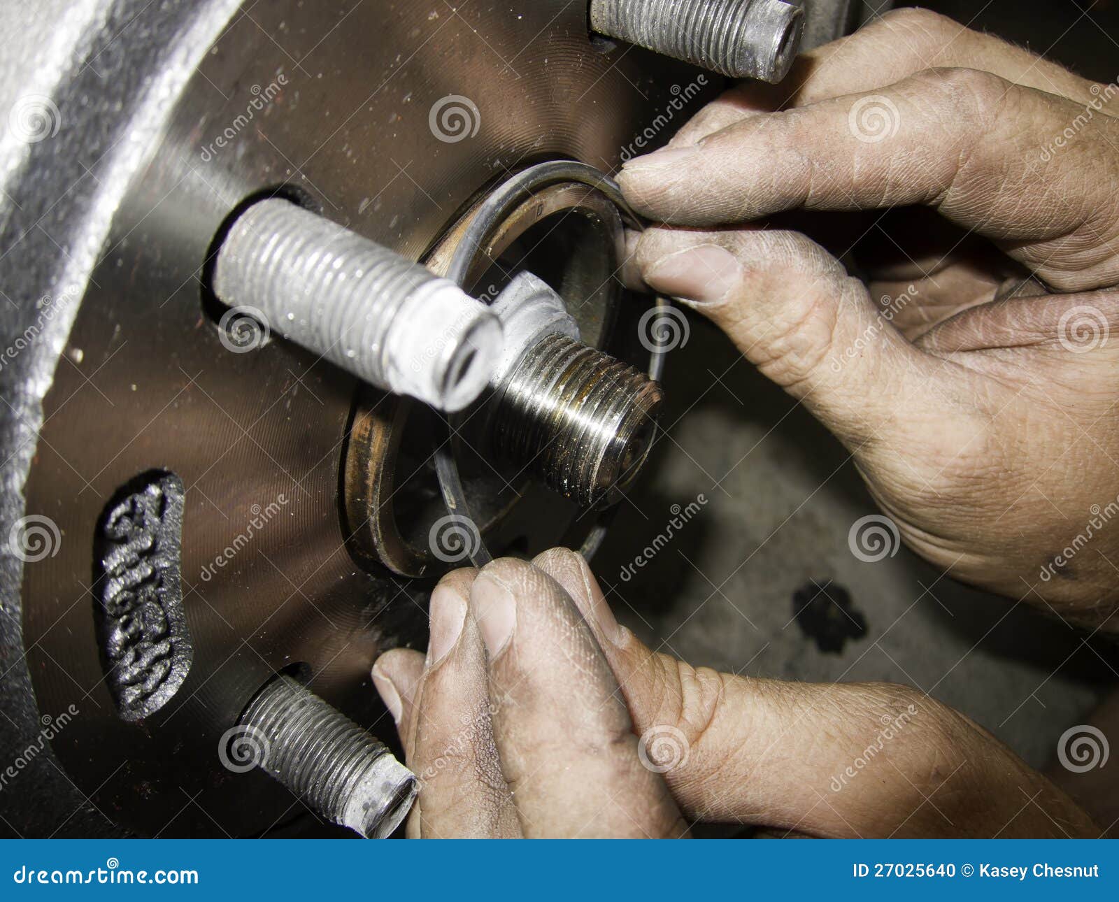 Mechanic hands fixing car stock photo. Image of metal 27025640