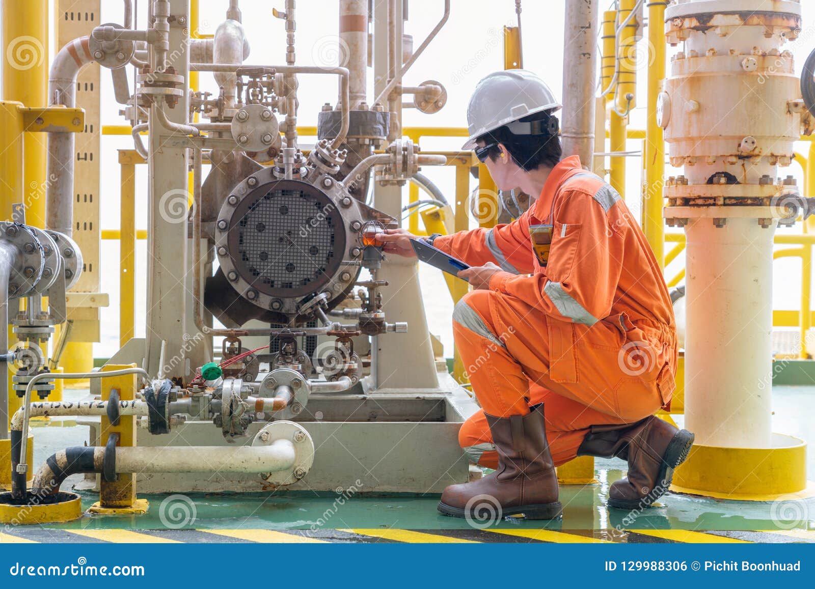 mechanic-inspector-engineer-check-condition-of-crude-oil-centrifugal-pump-and-lube-oil-system-at