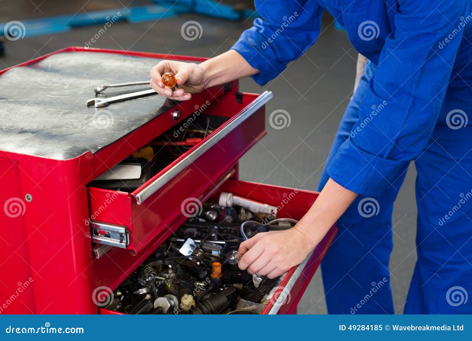Mechanic Looking for Tool in Drawers Stock Image Image of person