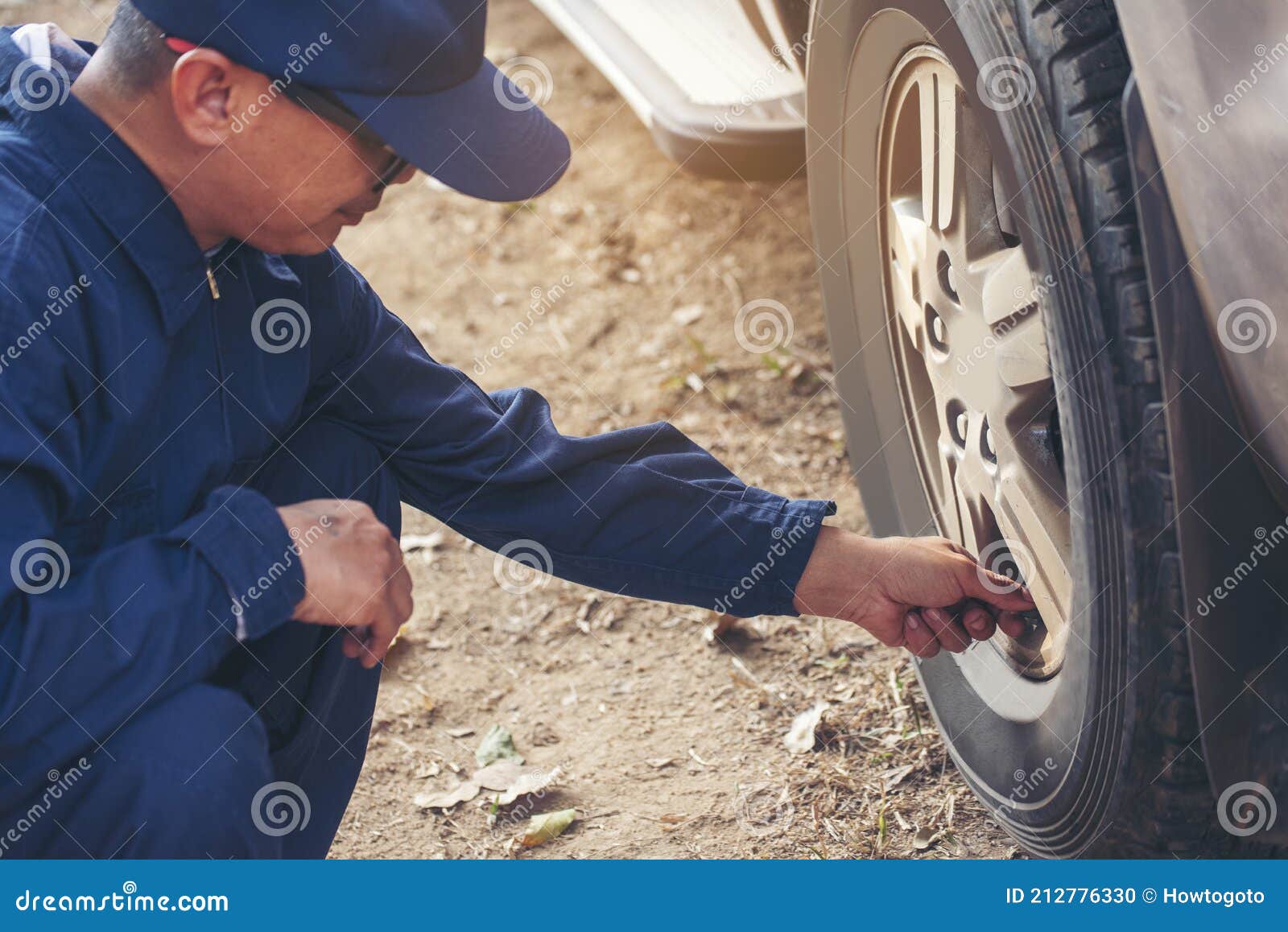 Mechanic Man Hands Checking Car Tires Outdoor on Site Service Auto Garage  for Automotive Mobile Center Services. Technician Stock Photo - Image of  mechanic, engineering: 212776330