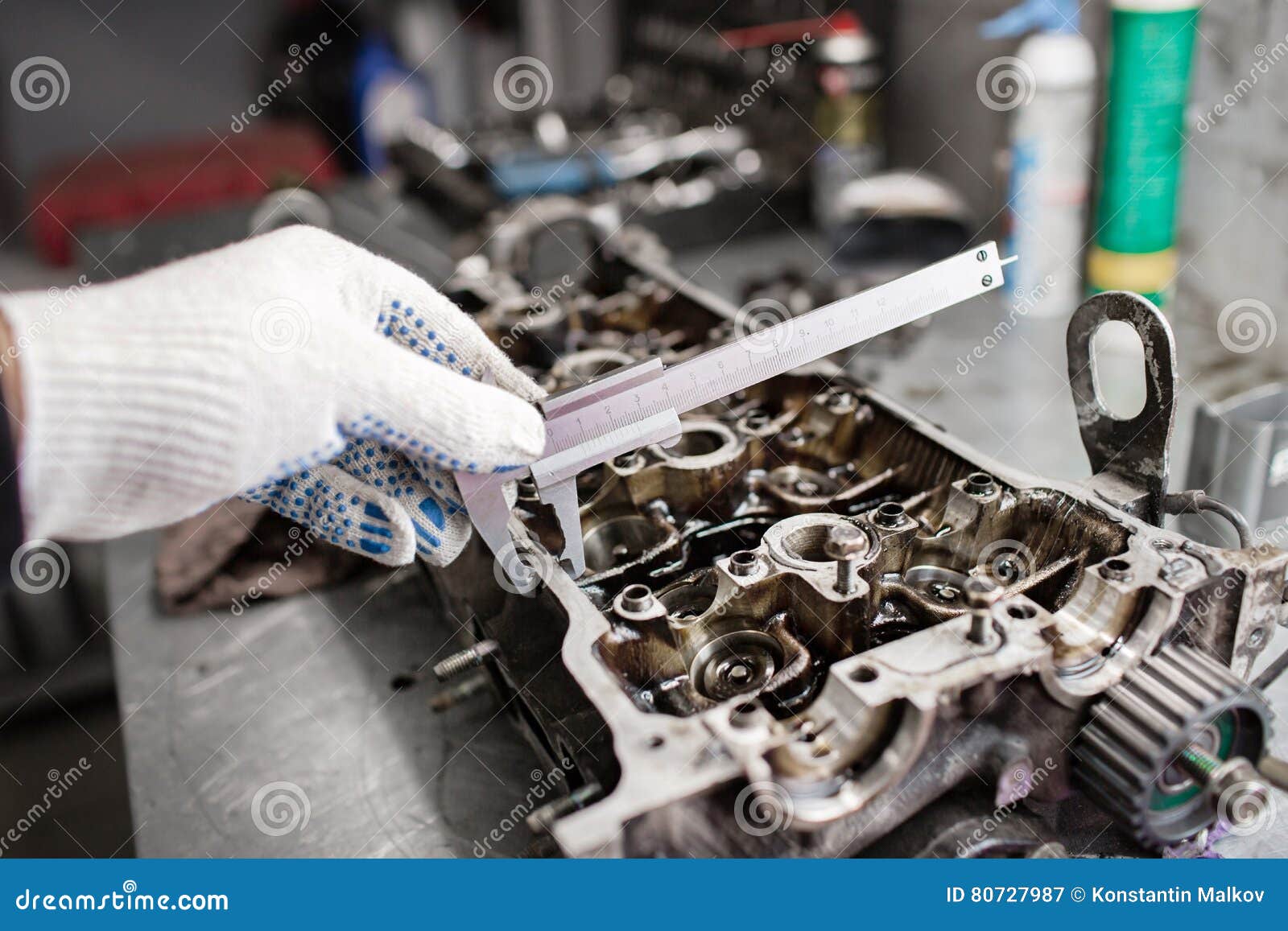 Mechanic, Using a Calipher, To Check the Thickness. Full Engine Major