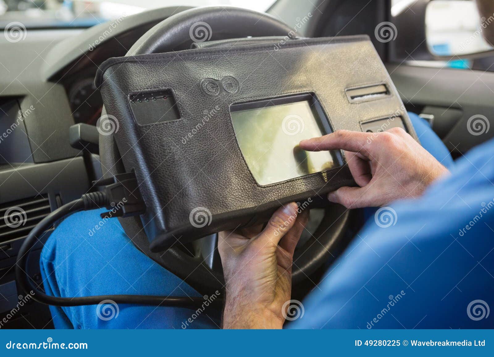 Mechanic Using Diagnostic Tool in the Car Stock Image Image of