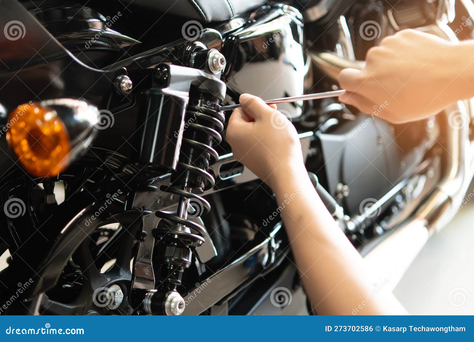 Mechanic Using Tools Set Up Suspension Sag Compression and Rebound on a