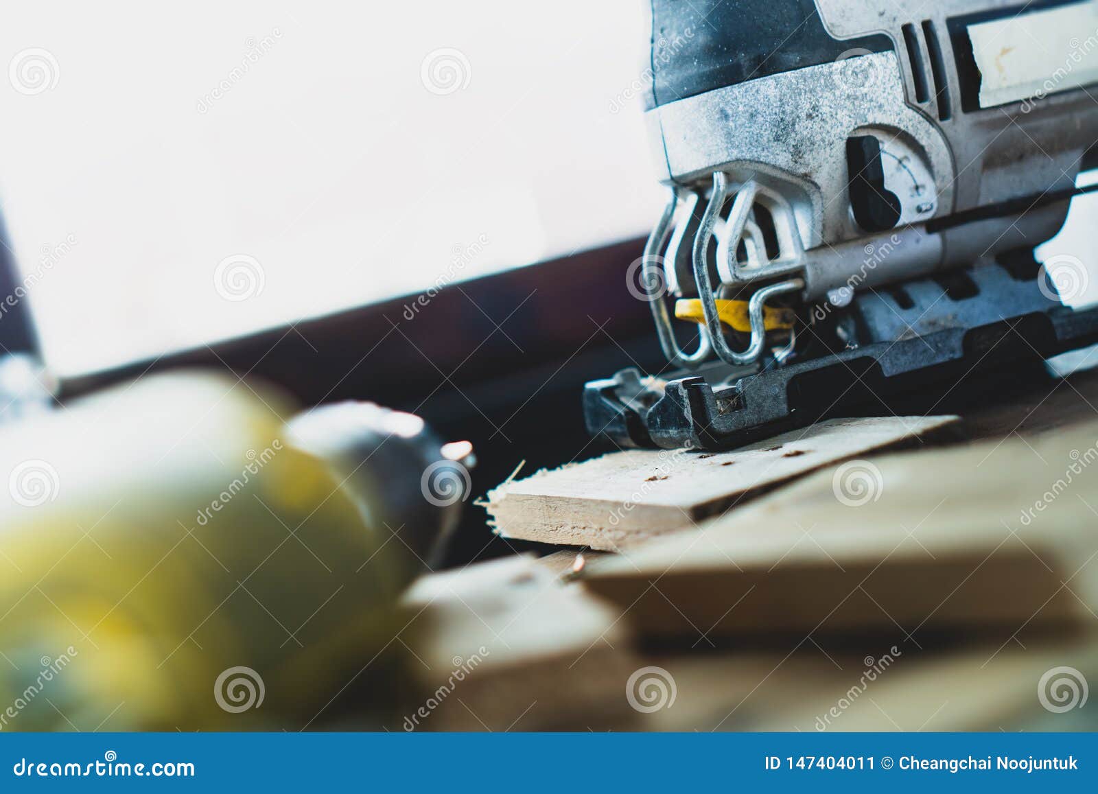 The Mechanic is Using Wood Cutting Tools in Construction Stock Image