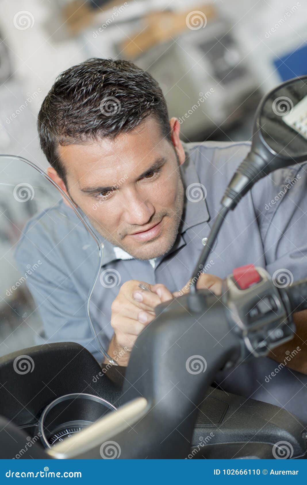 Mechanic Working on Front Modern Scooter Stock Photo Image of adjust