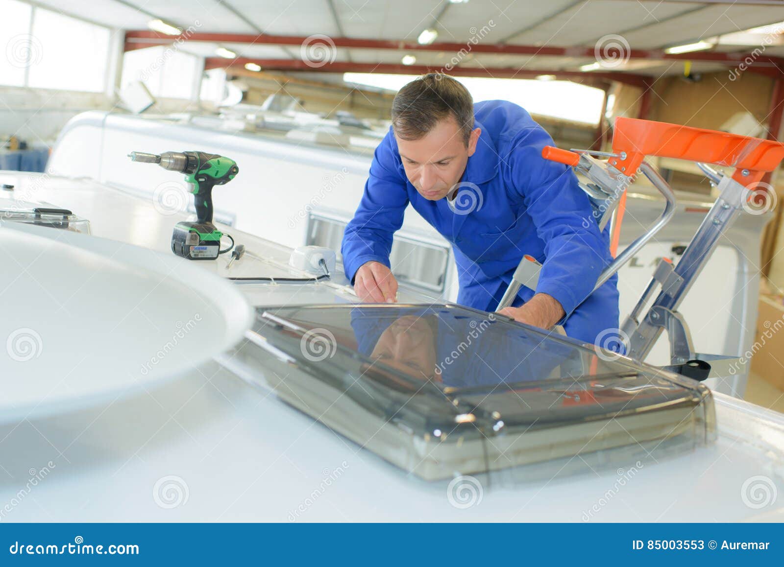 Mechanic Working on Roof Camper Van Stock Image Image of cordless, home 85003553