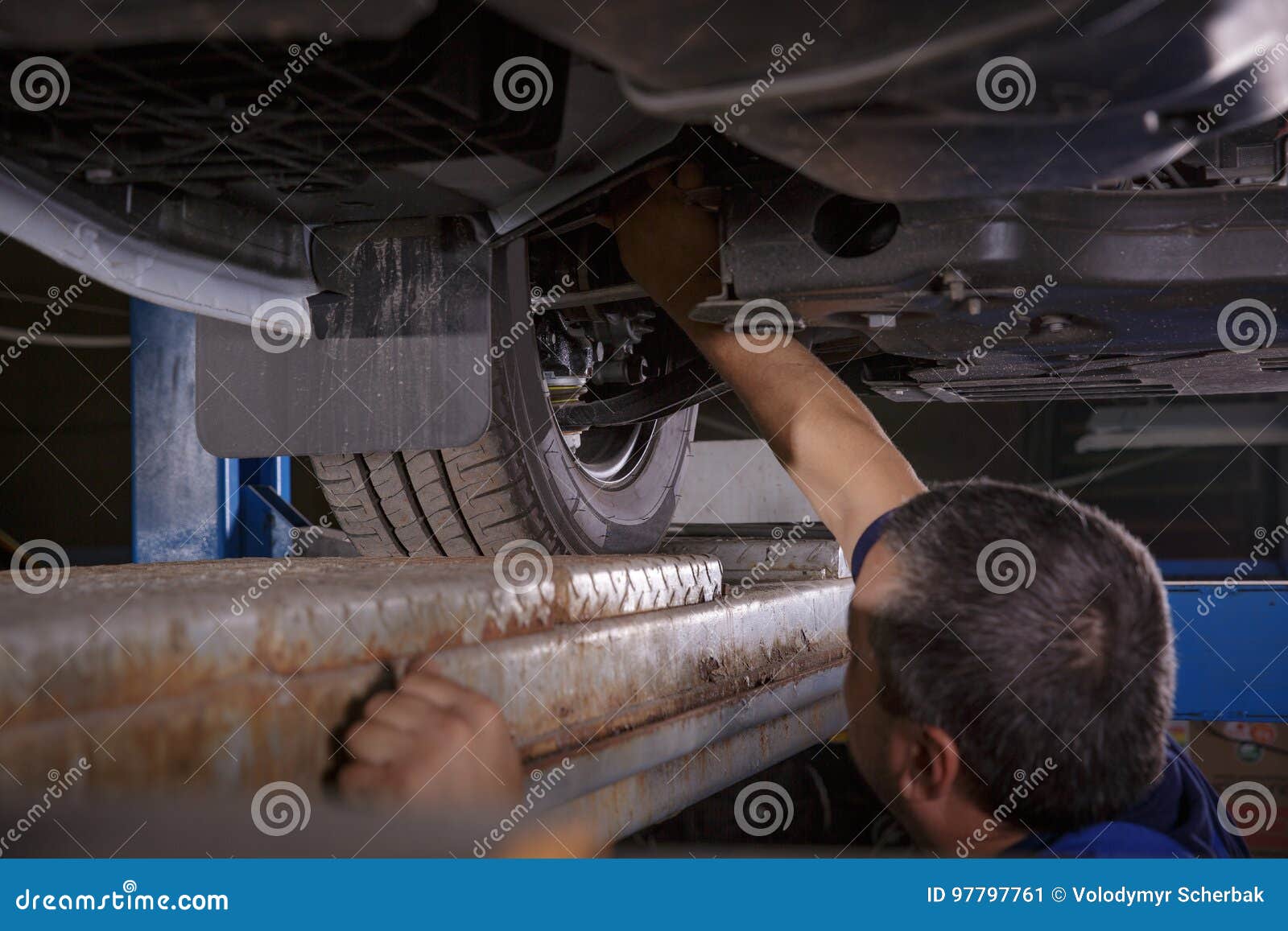 Mechanic Works on a Car in Body Shop Stock Image Image of breakdown