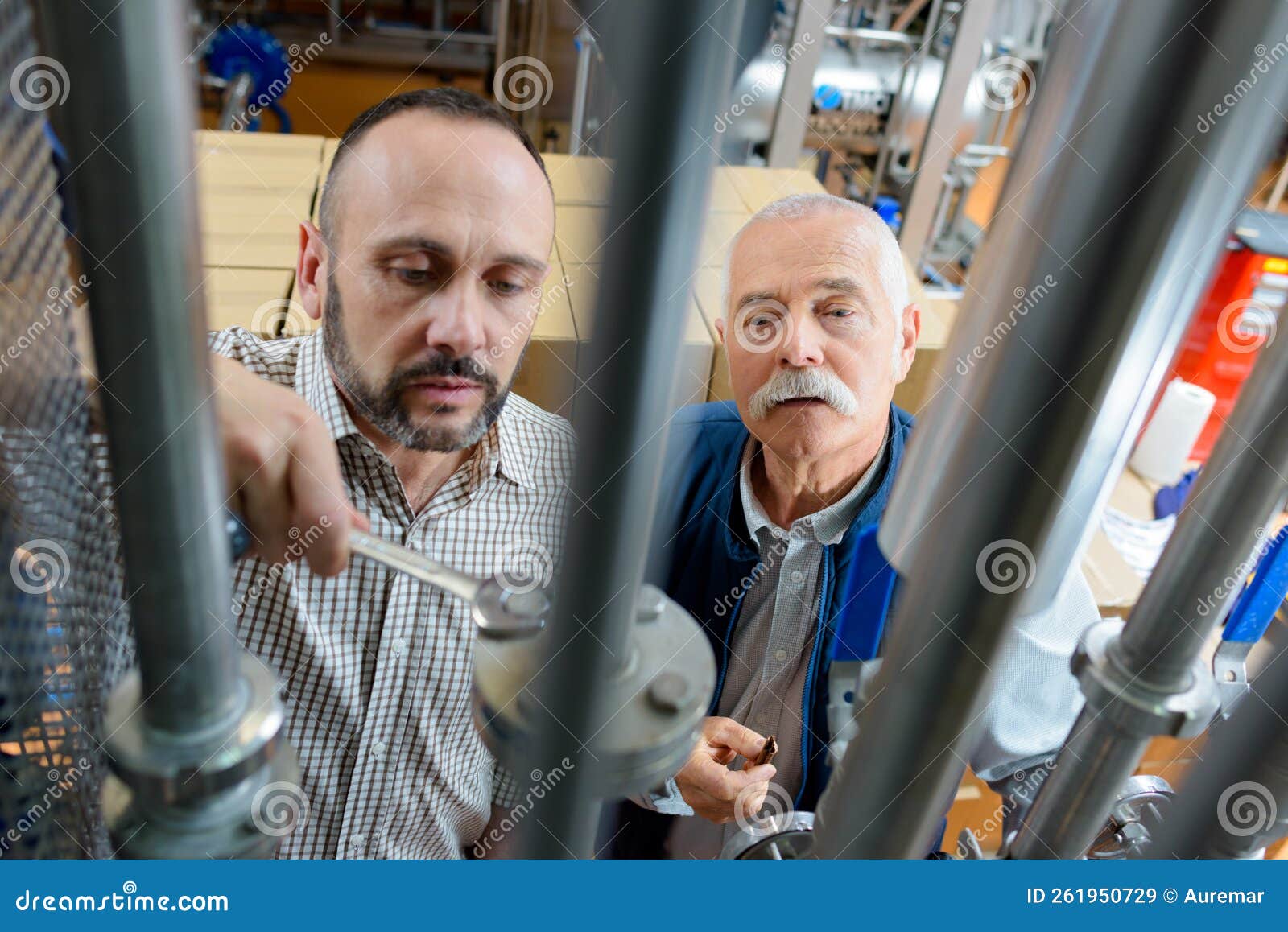 Mechanic with Wrench Working in Warehouse Stock Image Image of