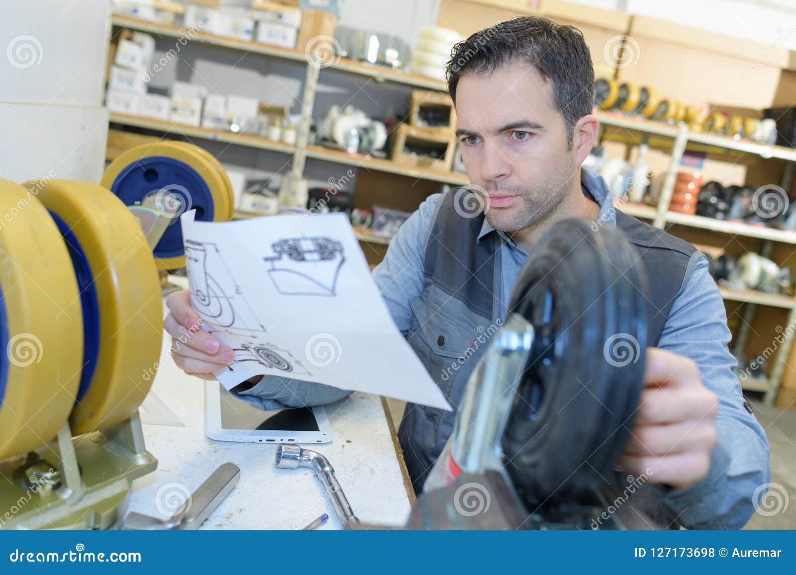 Mechanical Engineer Checking Technical Drawings Stock Photo - Image of