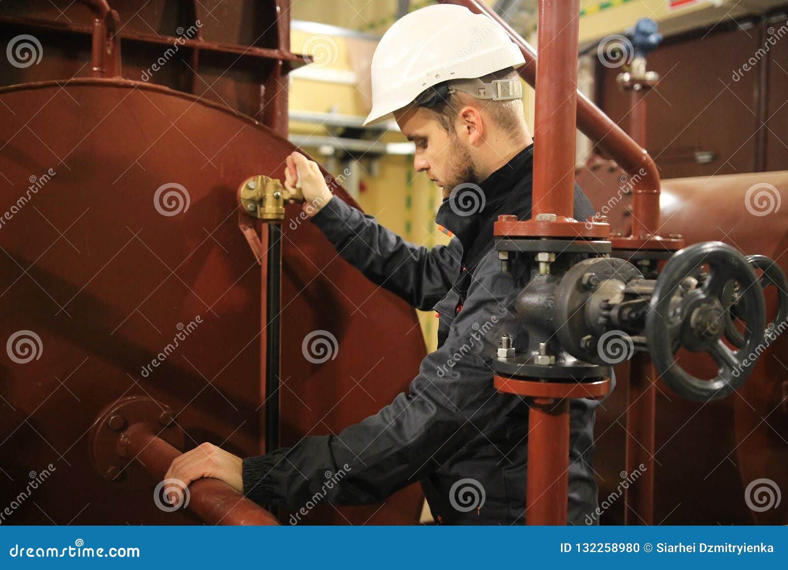 mechanical engineer in facility oil and gas. service work in tank of technical water.