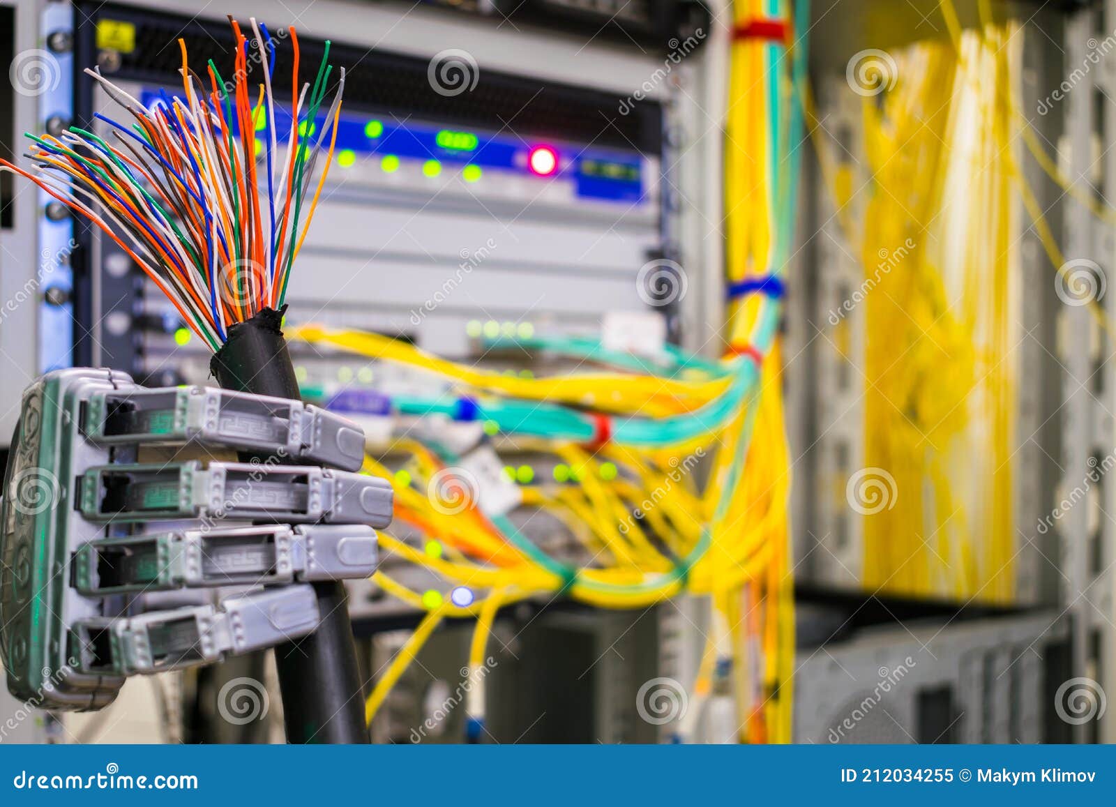 A Mechanical Robot Arm Holds a Damaged Cable in the Data