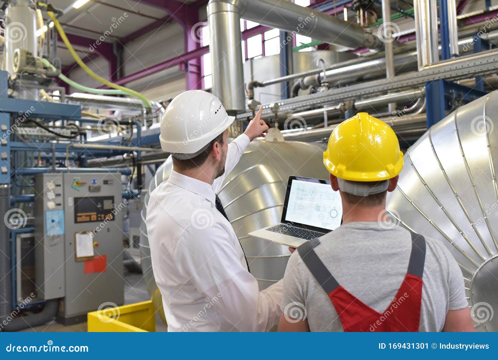 Mechanics Repair A Machine In A Modern Industrial Plant Profession