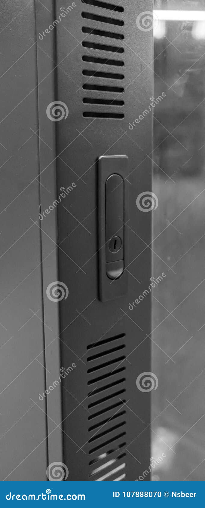 Close Up Of A Locking Mechanism Seen On A Data Centre Cabinet Door