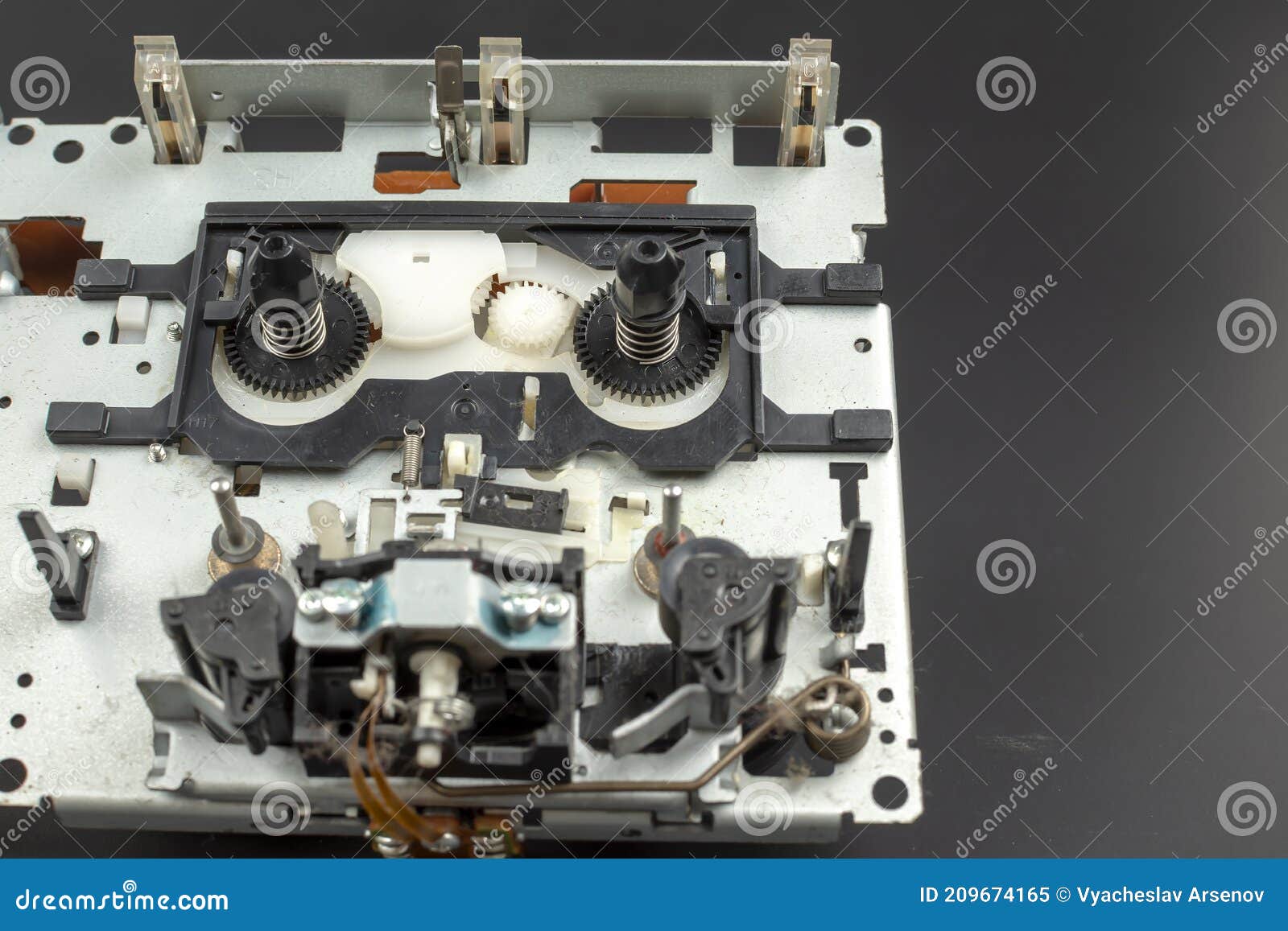Mechanism for a Tape Recorder with Gears in an Exploded View Closeup