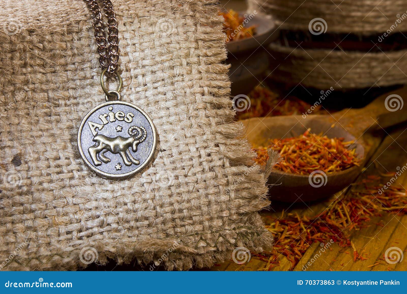 medallion with the sign of aries and saffron
