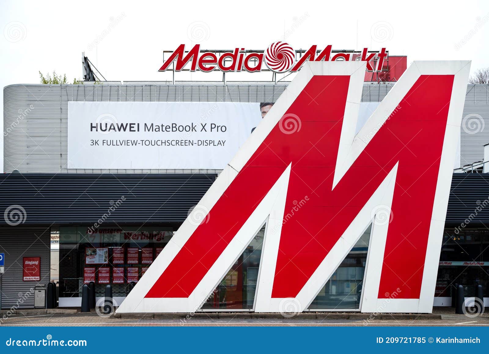 Media Markt Sign with Big Letter M in Front of a Store Editorial Image -  Image of center, concept: 209721785