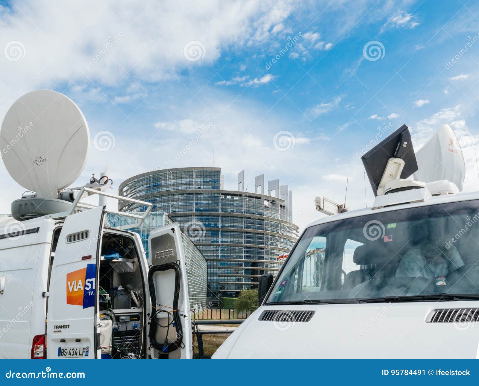 Media TV Truck Van Parked in Front of Parliament European Building