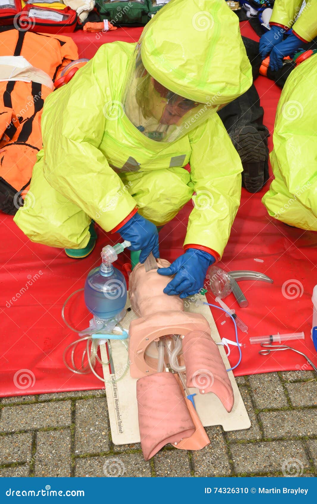 Medic in Breathing Apparatus and CBRN Suit Practices Resuscitation
