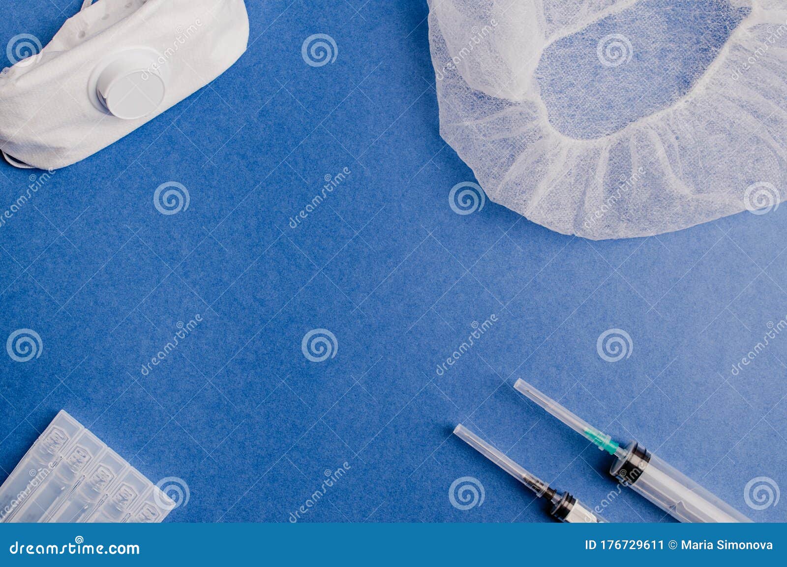 Medical Ampoules with Solution, Syringes and Protective Mask Respirator