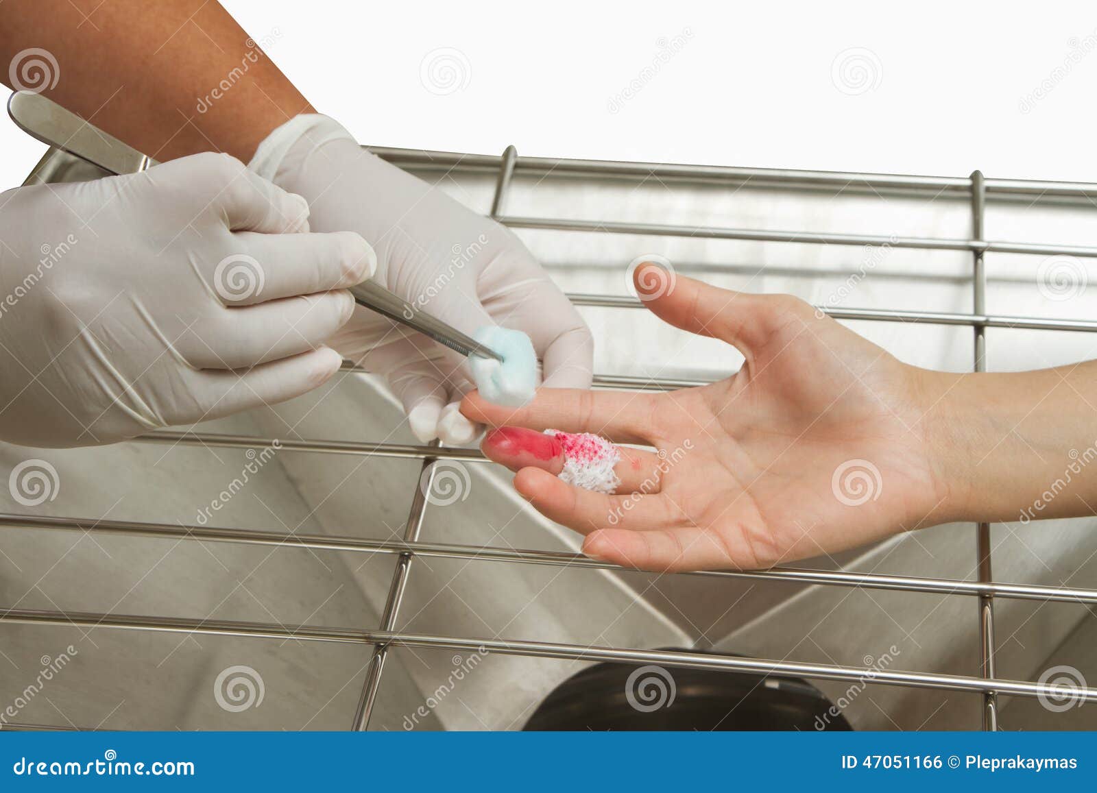 Medical Assistant Changes the Dressing of a Wound Stock Photo Image