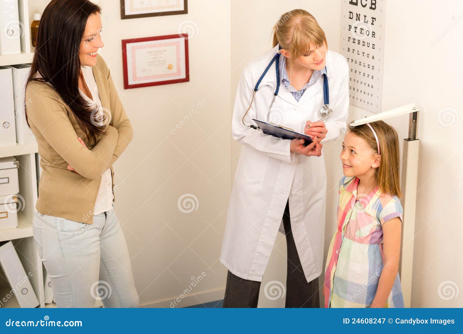 medical check-up at pediatrist girl measure height
