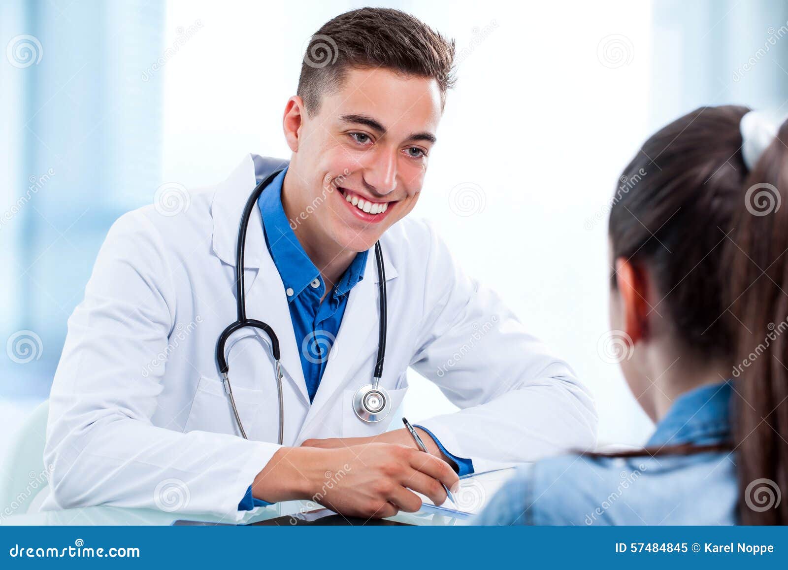 Medical Doctor With Patient