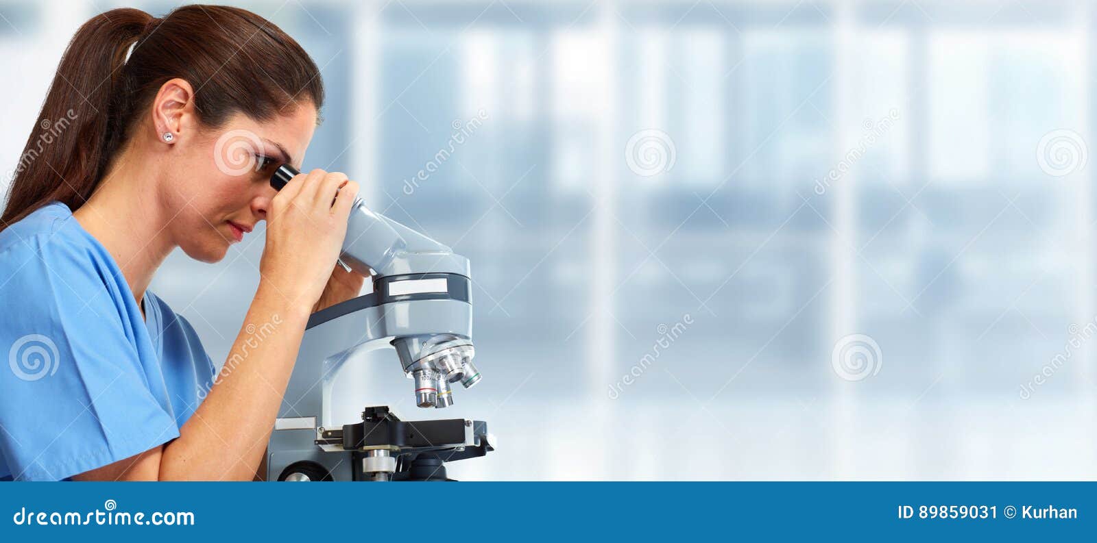 medical doctor with microscope