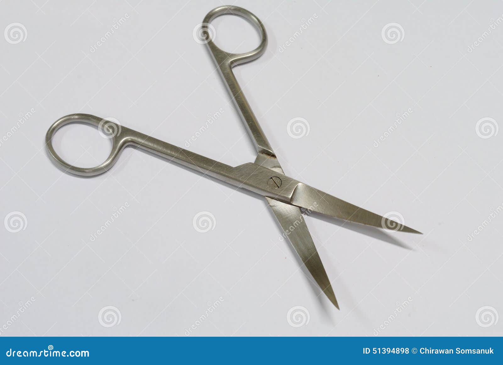 Scalpel And Surgical Scissors With Step Pile Of Gold Coins RoyaltyFree