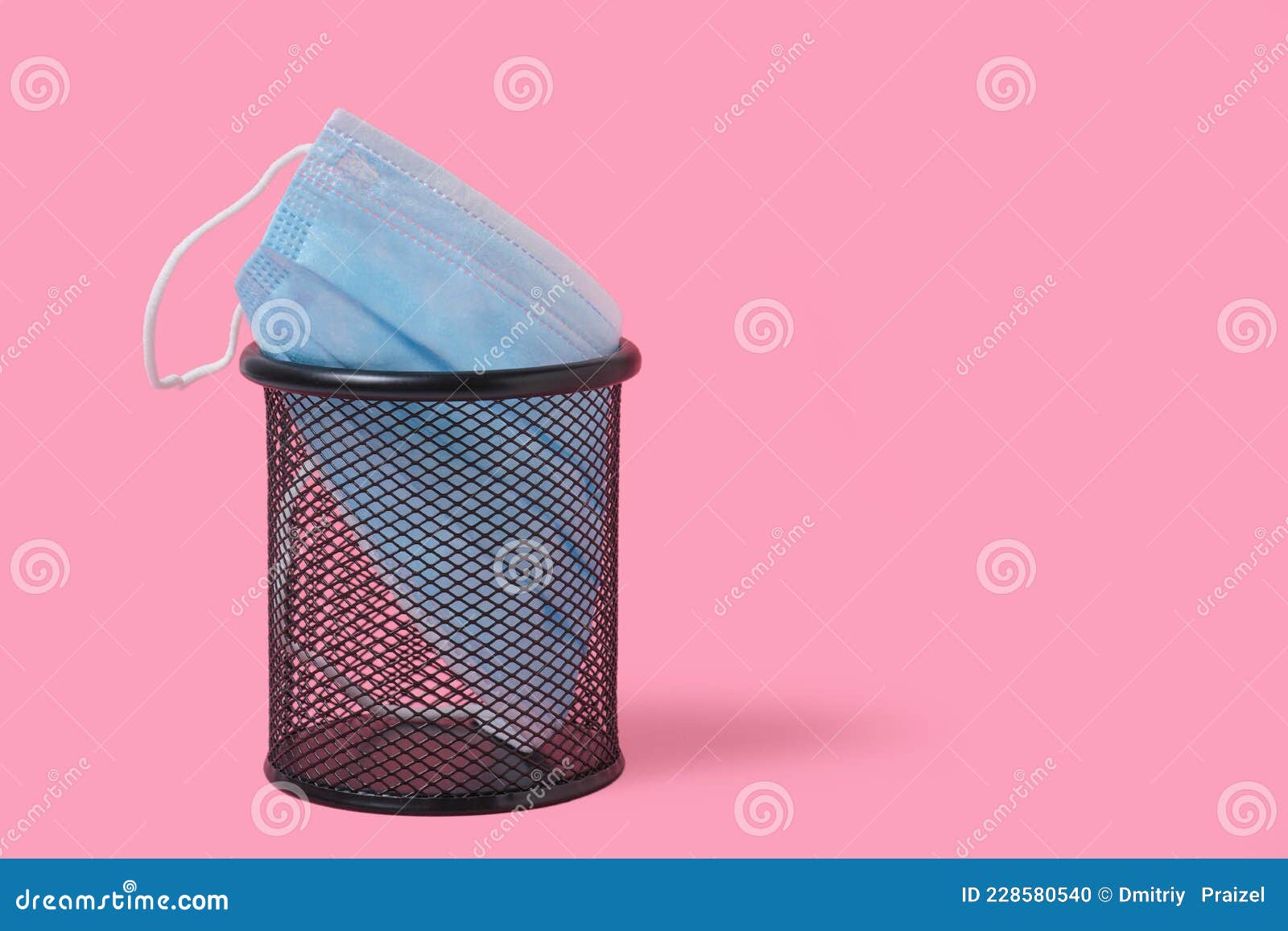 Medical Mask in a Trash Can on a Pink Background Stock Photo Image of