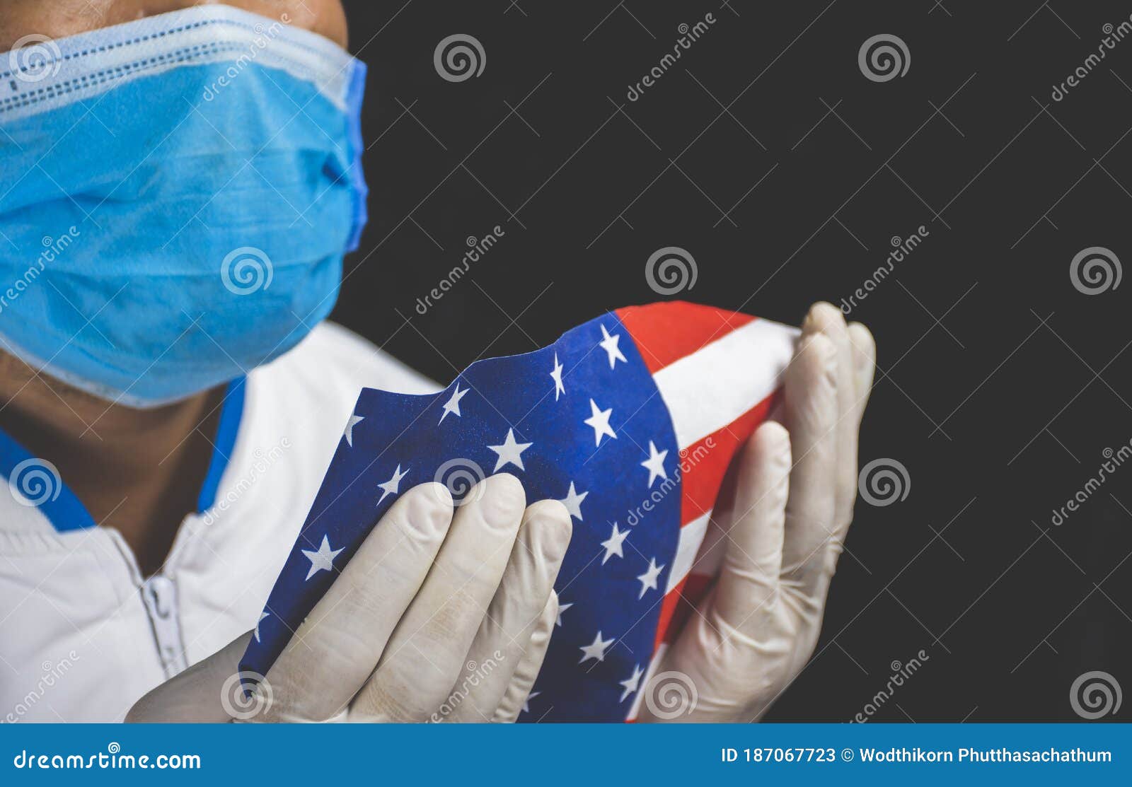 Medical Personnel Holding the American Flag Stock Image - Image of ...