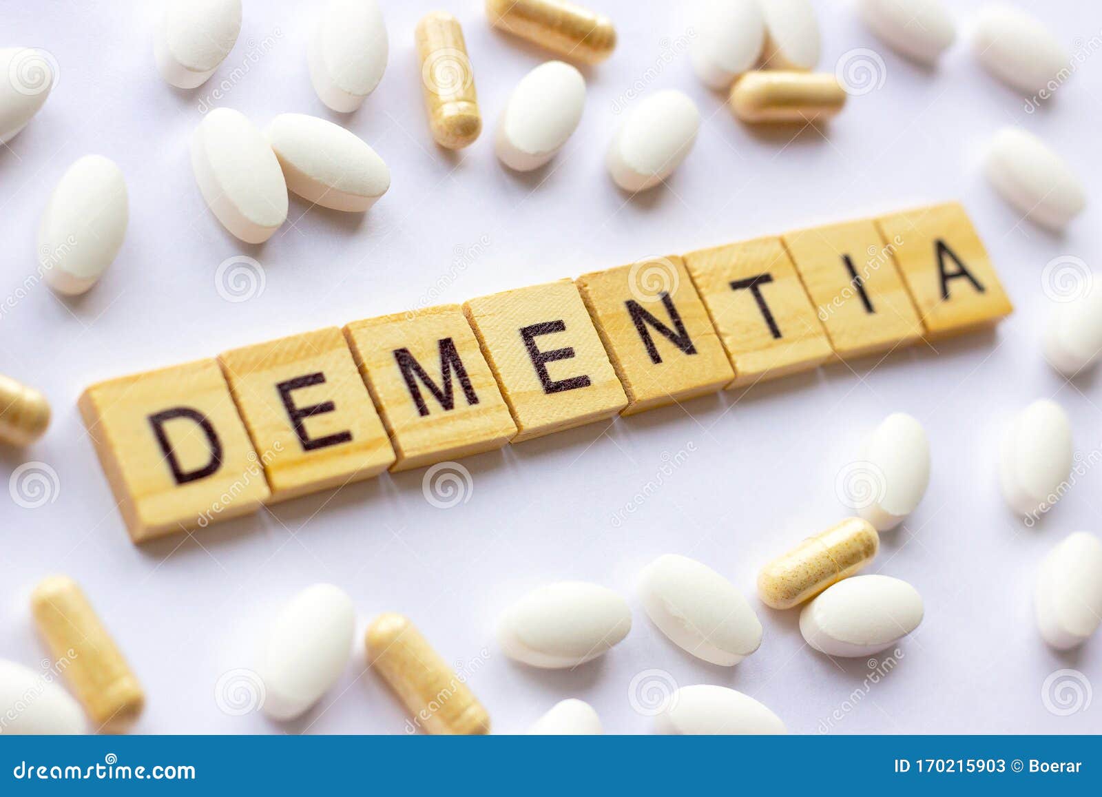 the medical phrase dementia on different pills and capsules background. pharmacy theme, health care
