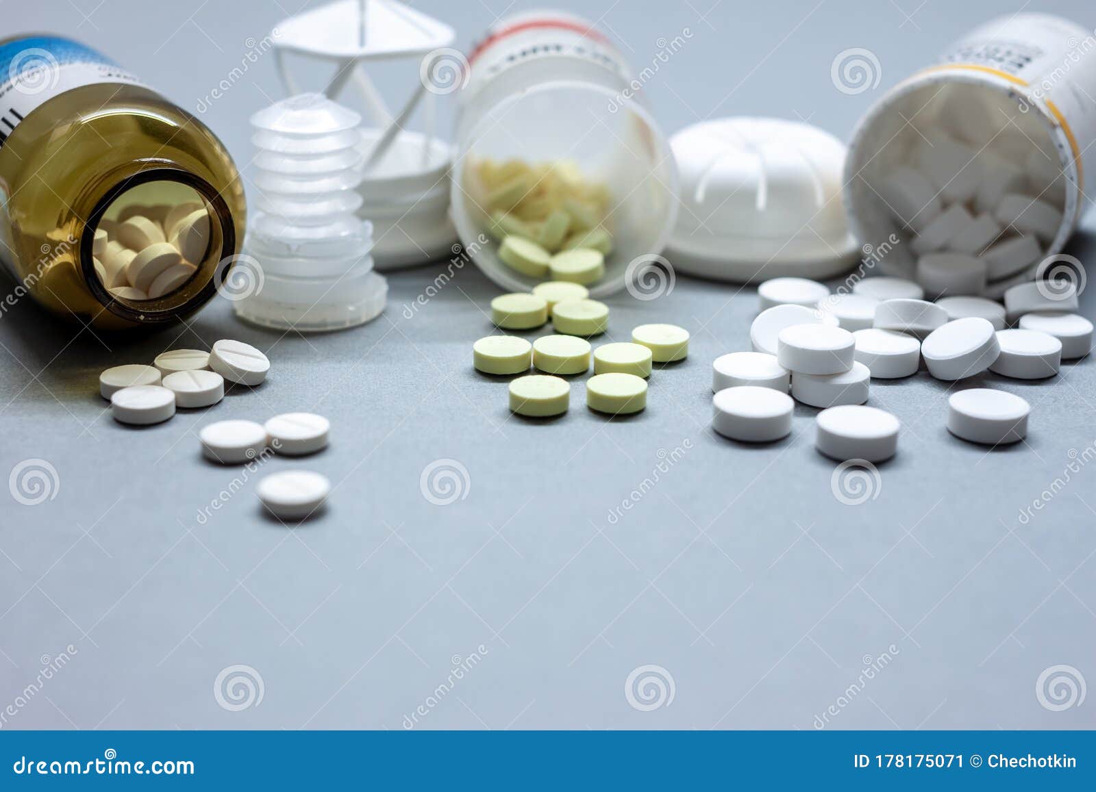 Medical Pills and Tablets on Table Next To Bottles Stock Image Image
