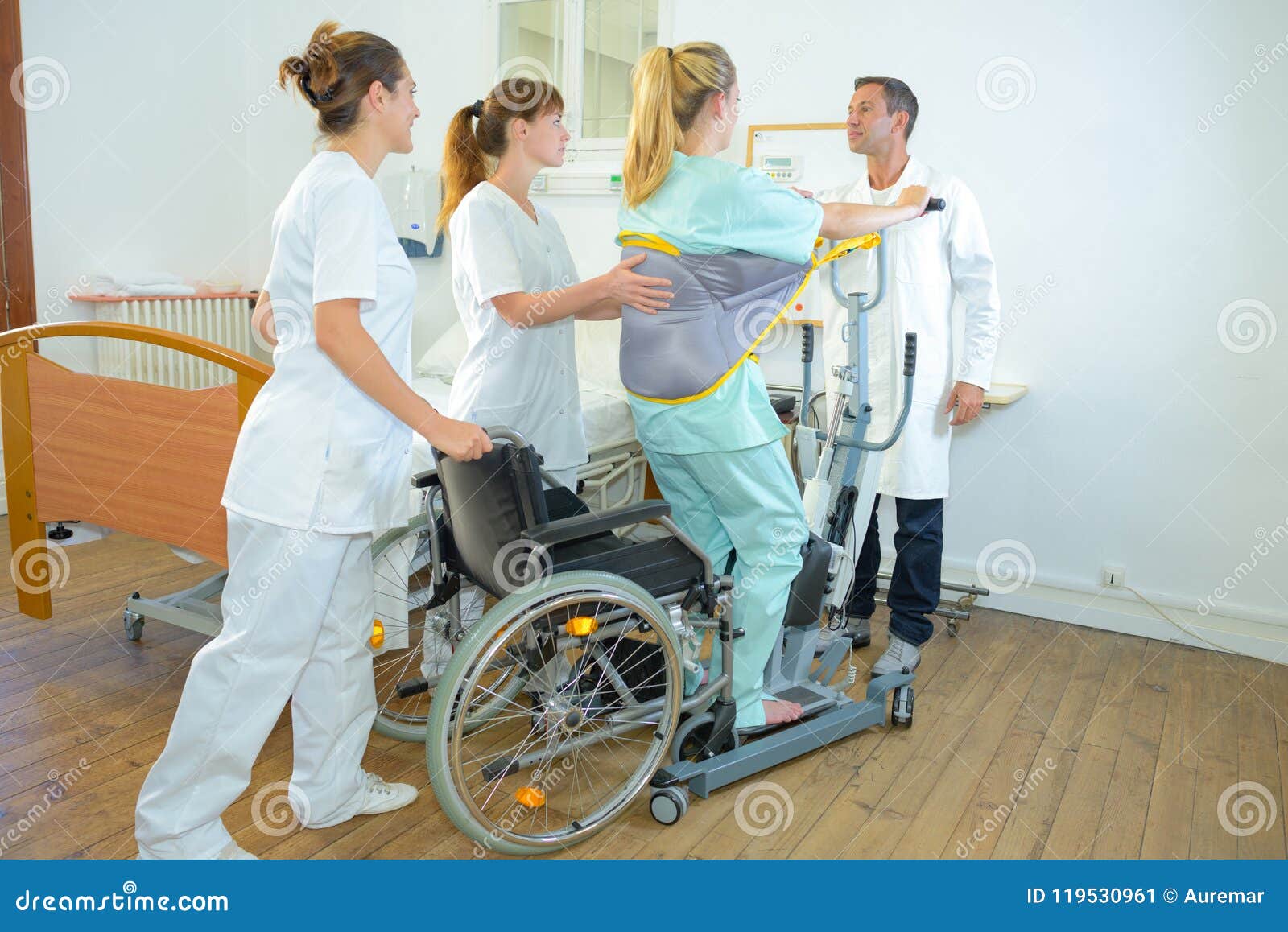 medical staff helping woman to standing