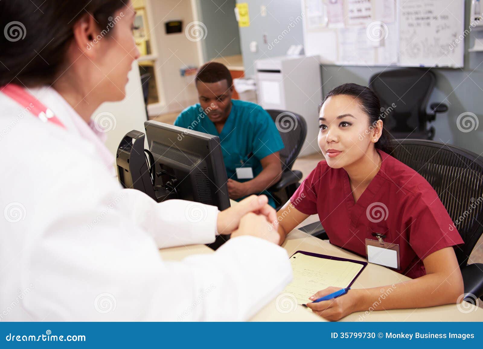 medical staff meeting at nurses station