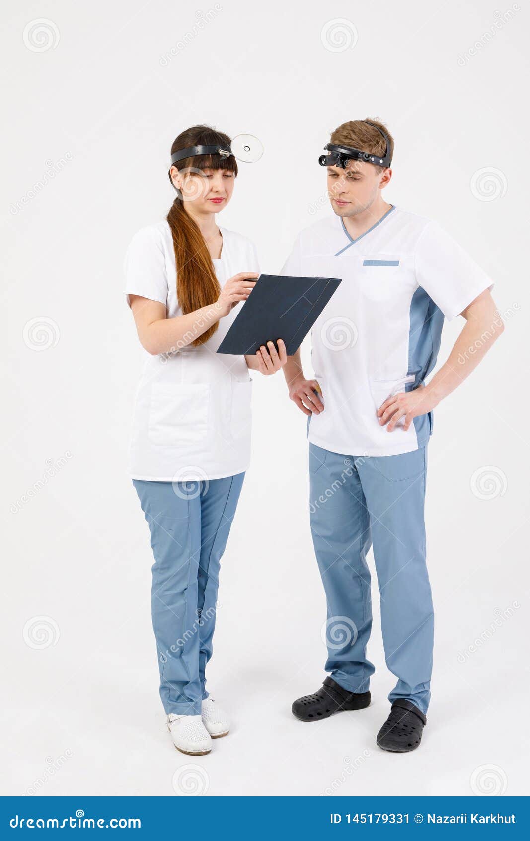 medical staff. portrait of two otolaryngologists working on an  white background that solves various issues