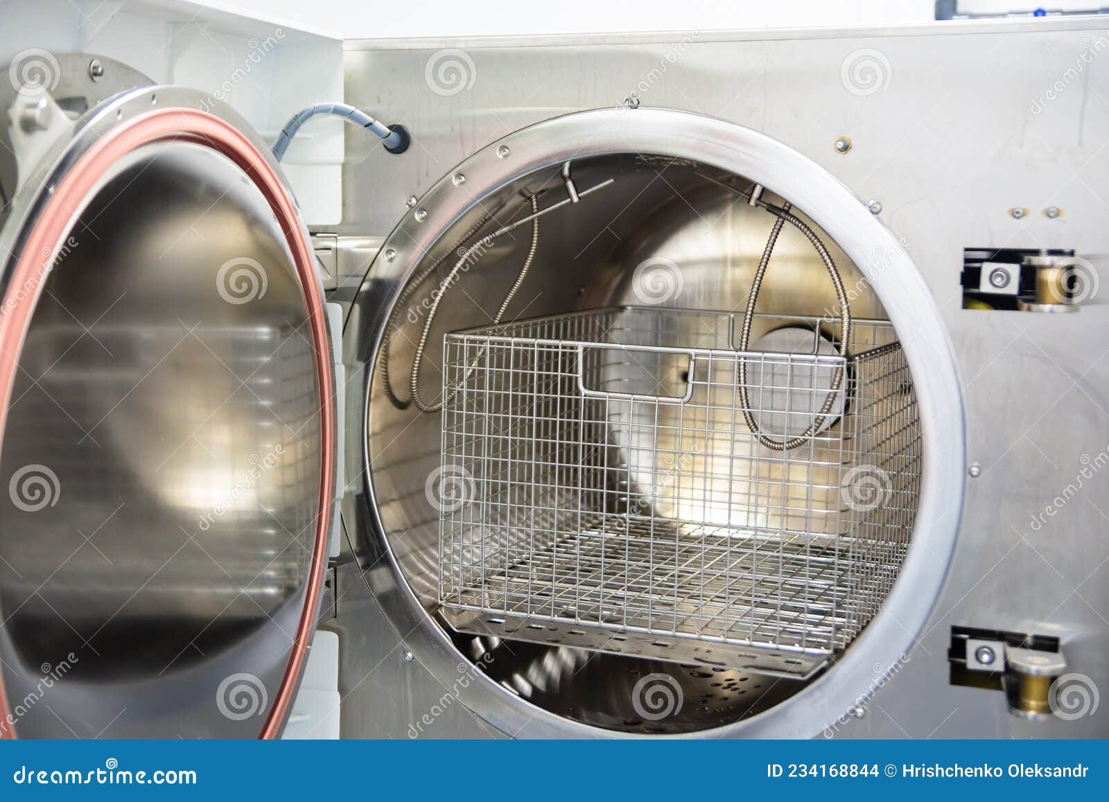 Medical Sterilizer. Laboratory Technician Sterilizes Medical