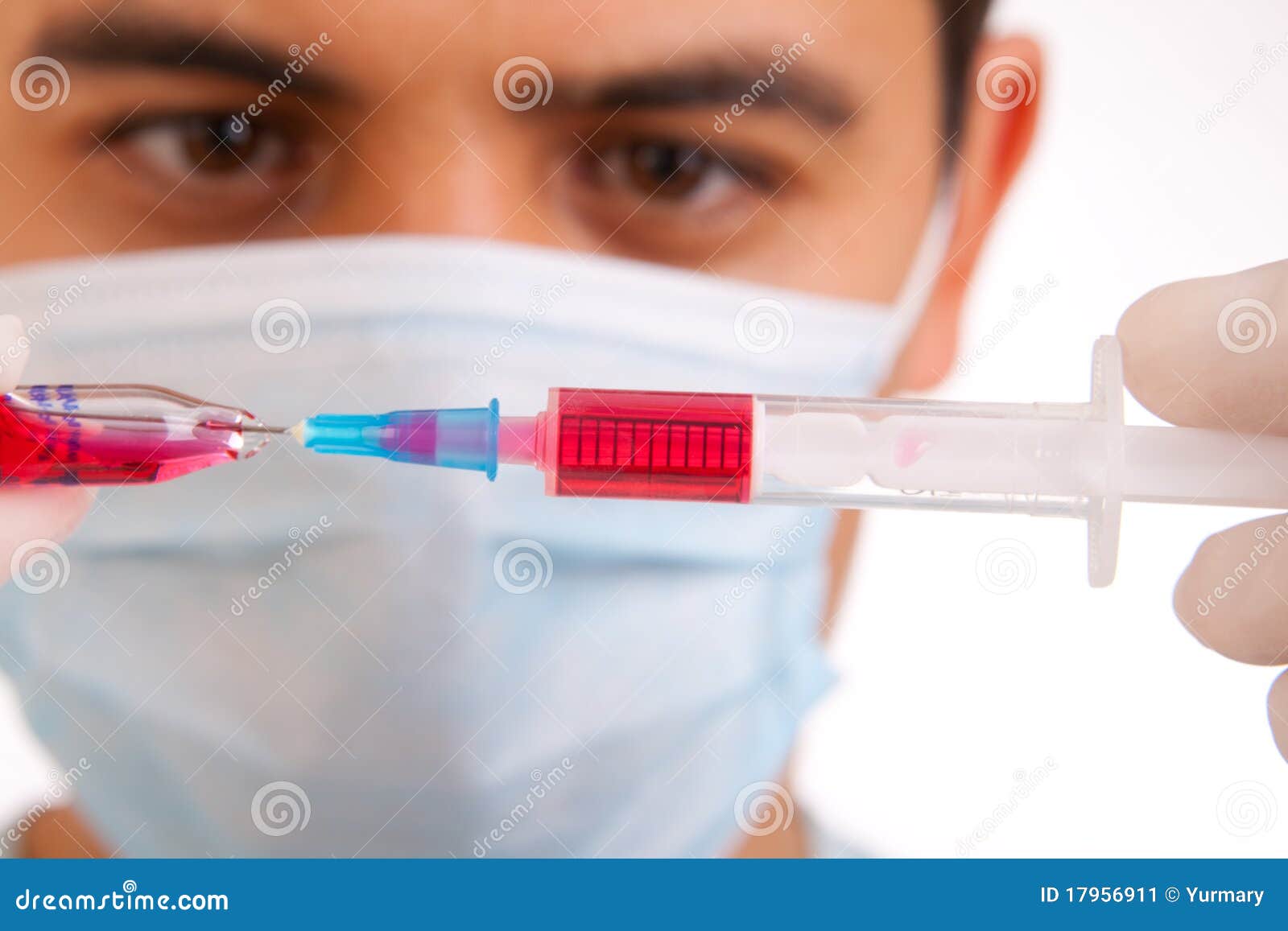 medical syringe in hands