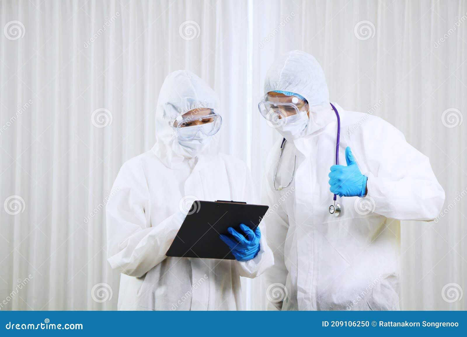 Medical Team in Personal Protective Equipment or PPE Clothing ...