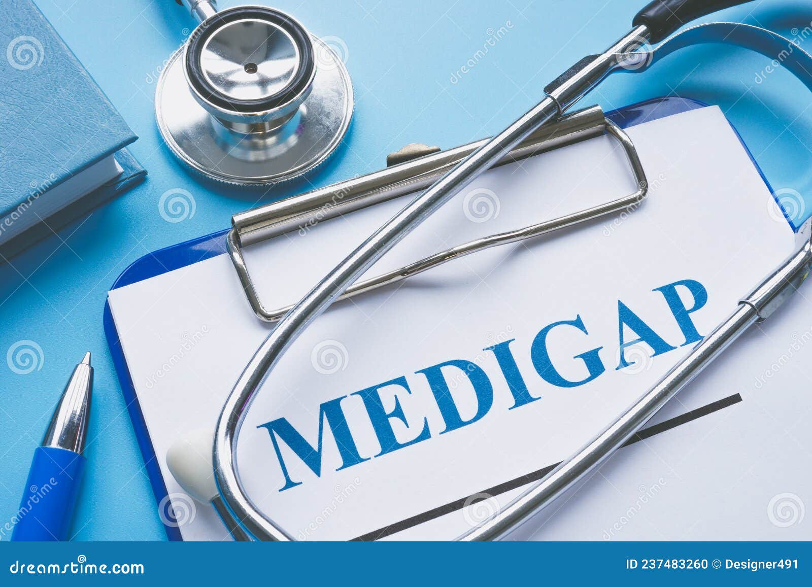 medicare supplement insurance medigap application and stethoscope.